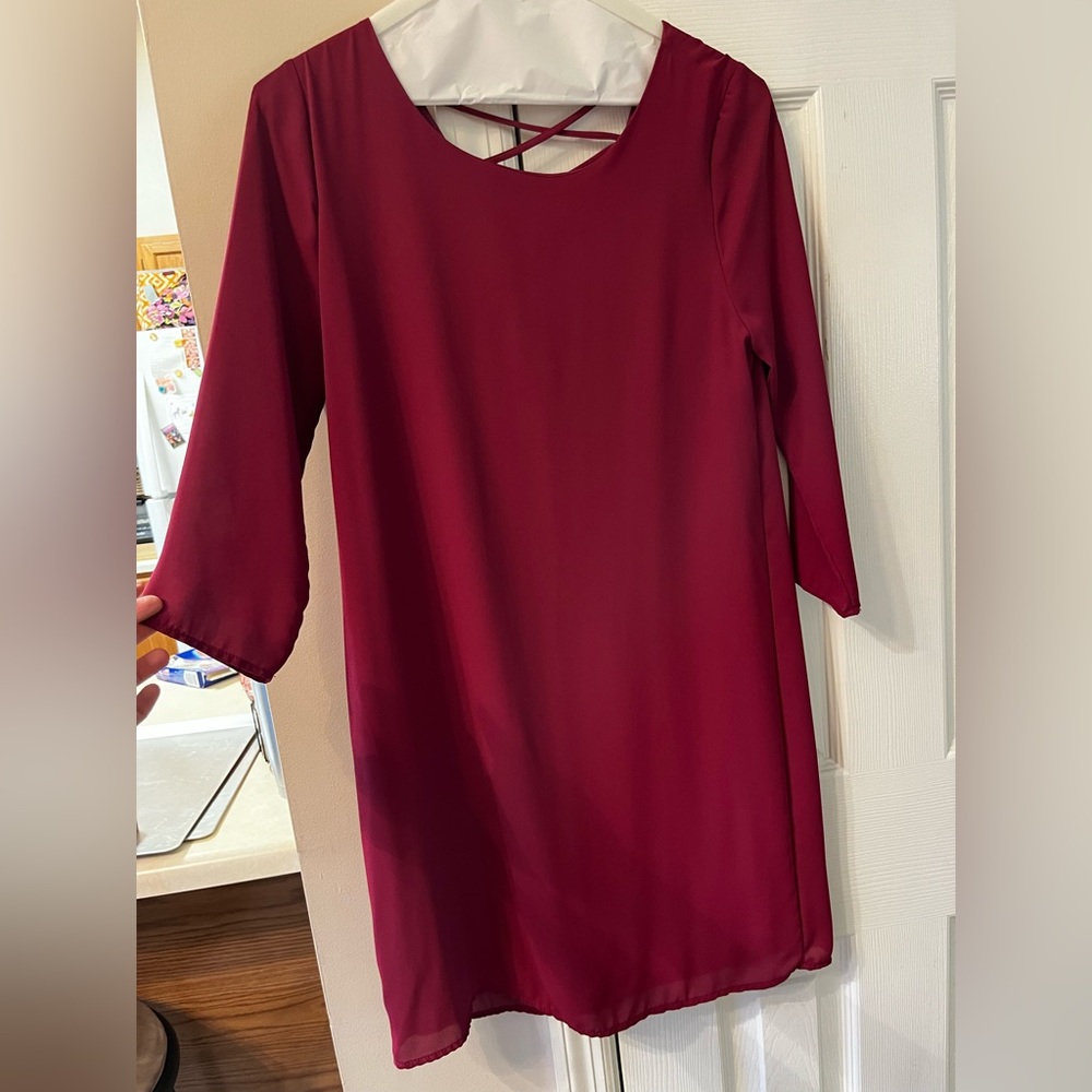 Mid length maroon dress with 3/4 length sleeves